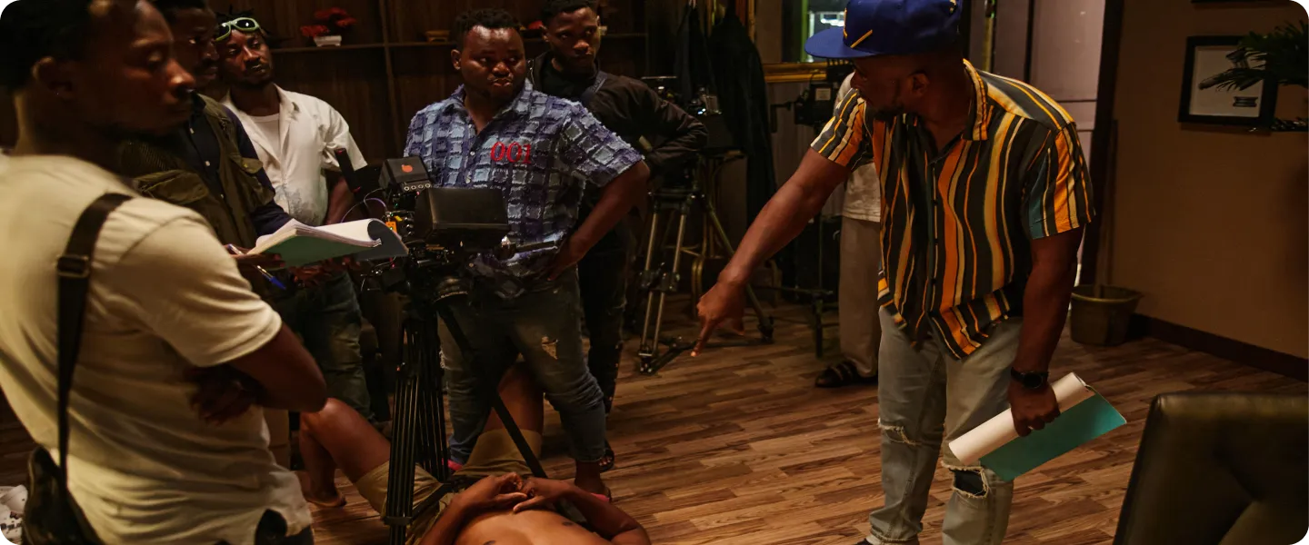 Director briefing the production crew on set.