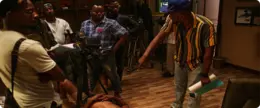 Director briefing the production crew on set.